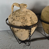 Antique two jug wrought iron carrier