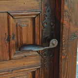 Antique framed single panel pine door with carved raised panels
