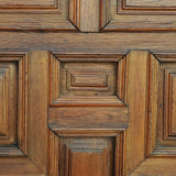 Antique framed single panel pine door with carved raised panels