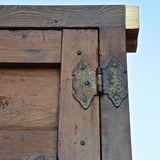Antique framed single panel pine door with carved raised panels