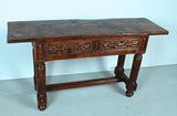 Turned leg two-drawer console table with chain carving