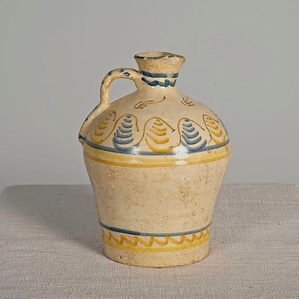 Antique single handle painted & glazed oil pitcher, “Blue & yellow motifs”