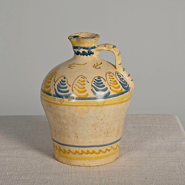 Antique single handle painted & glazed oil pitcher, “Blue & yellow motifs”