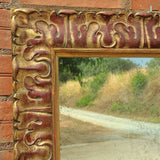 Antique carved and gilt mirror
