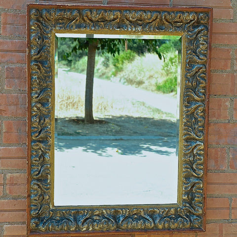 Antique carved and painted wooden mirror frame
