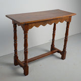 Antique scalloped skirt console table, walnut and oak