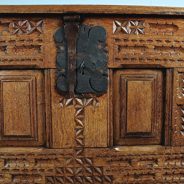 Antique carved and paneled Basque arms chest, oak