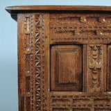 Antique carved and paneled Basque arms chest, oak