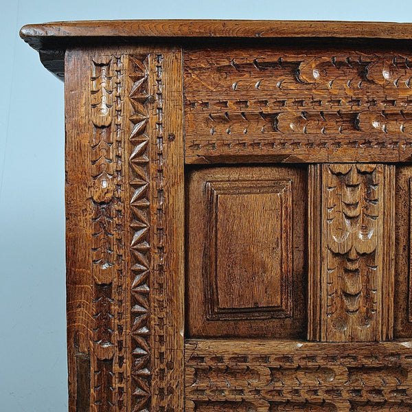 Antique carved and paneled Basque arms chest, oak