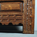 Antique carved and paneled Basque arms chest, oak