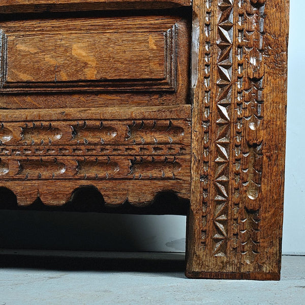 Antique carved and paneled Basque arms chest, oak