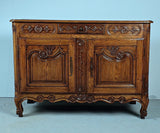 Antique carved two-door, single-drawer credenza, oak