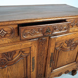 Antique carved two-door, single-drawer credenza, oak