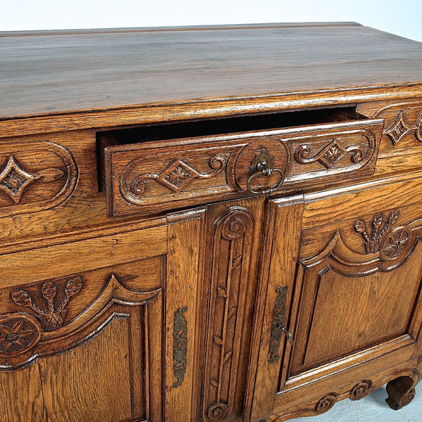 Antique carved two-door, single-drawer credenza, oak