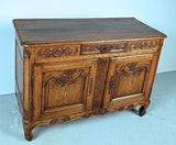 Antique carved two-door, single-drawer credenza, oak