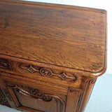 Antique carved two-door, single-drawer credenza, oak