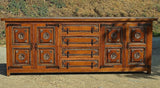 Antique four-door, four-drawer credenza