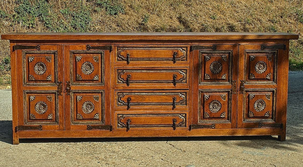 Antique four-door, four-drawer credenza