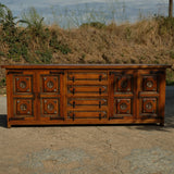 Antique four-door, four-drawer credenza