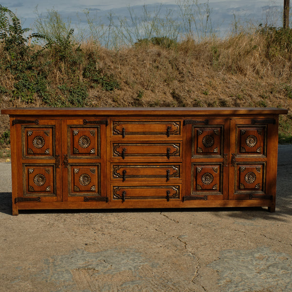 Antique four-door, four-drawer credenza