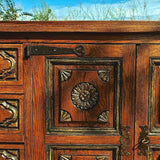 Antique four-door, four-drawer credenza