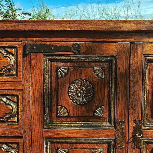 Antique four-door, four-drawer credenza