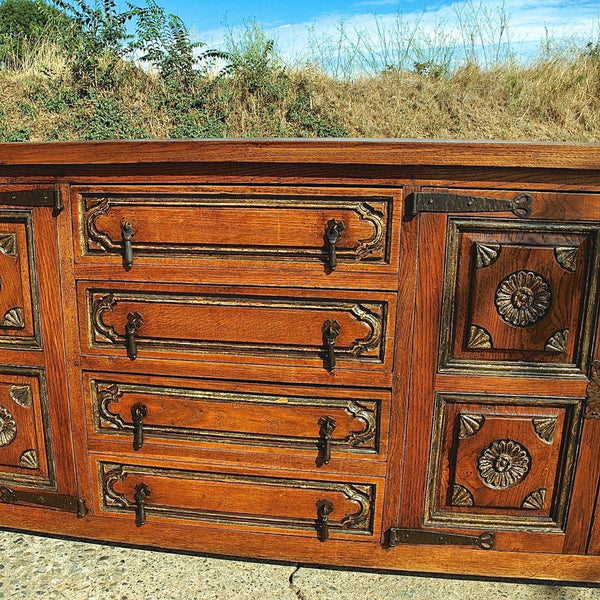 Antique four-door, four-drawer credenza