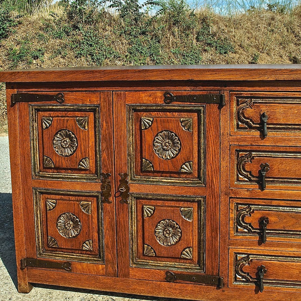 Antique four-door, four-drawer credenza