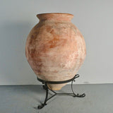 Antique large “Arabesque” oil jar on iron stand