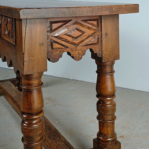 Antique carved two-drawer scalloped skirt library table, walnut
