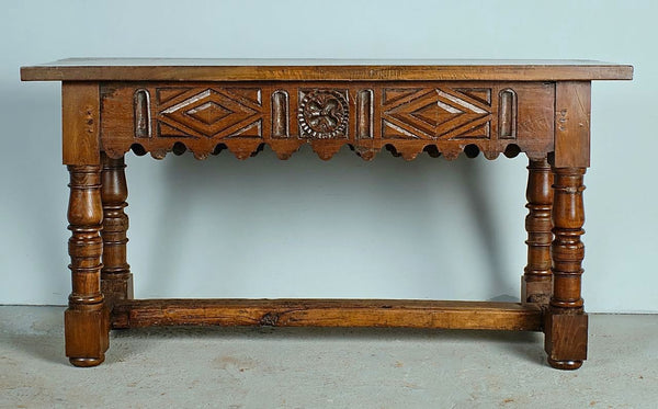 Antique carved two-drawer scalloped skirt library table, walnut