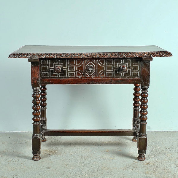 Antique carved edge lentil leg accent table with drawer, walnut