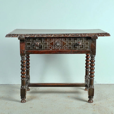 Antique carved edge lentil leg accent table with drawer, walnut