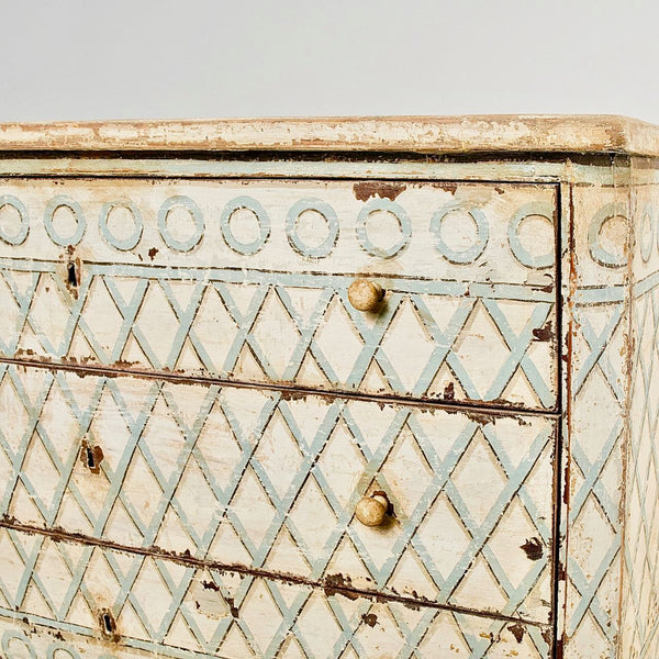 Antique painted three-drawer chest with latticework design