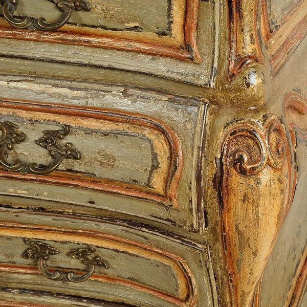 Antique painted four-drawer bombé chest