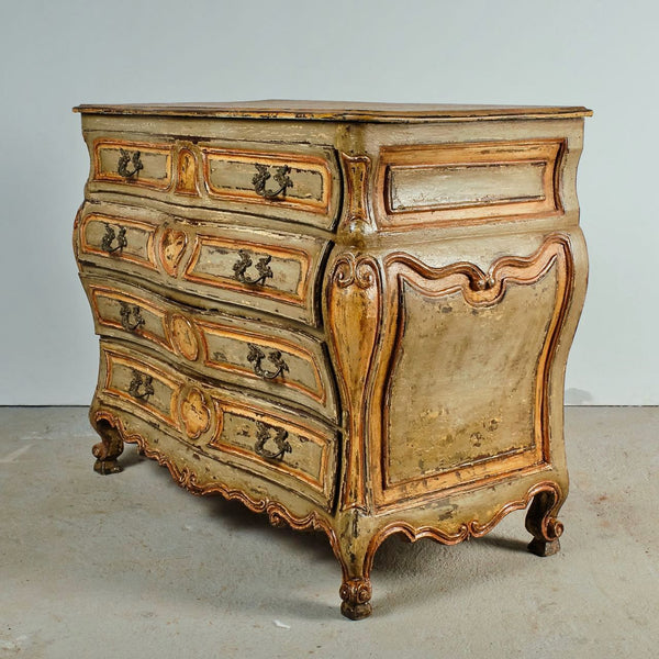 Antique painted four-drawer bombé chest