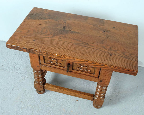 Antique turned leg accent table with carved drawer, oak