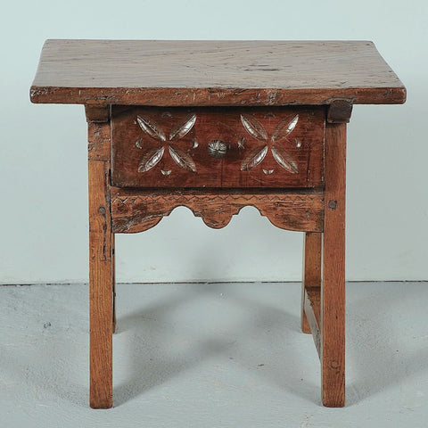 Antique tapered leg accent table with carved drawer, chestnut and oak