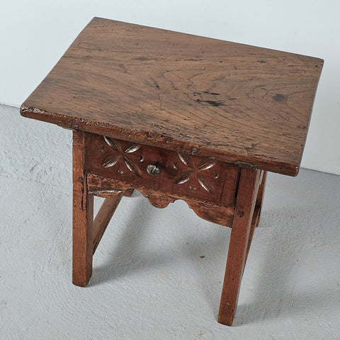 Antique tapered leg accent table with carved drawer, chestnut and oak