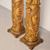 Antique pair of carved and gilt wooden columns, pine