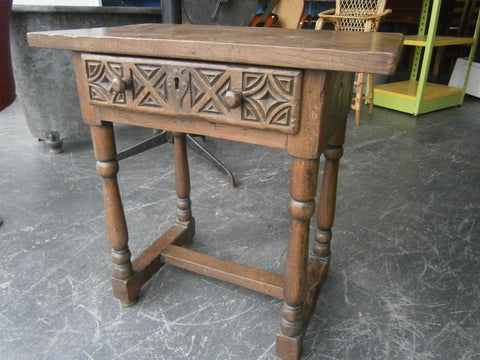 Antique turned leg accent table with carved drawer, chestnut and oak