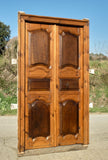 Antique framed two-panel library door, pine with walnut panels