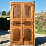 Antique framed two-panel library door, pine with walnut panels