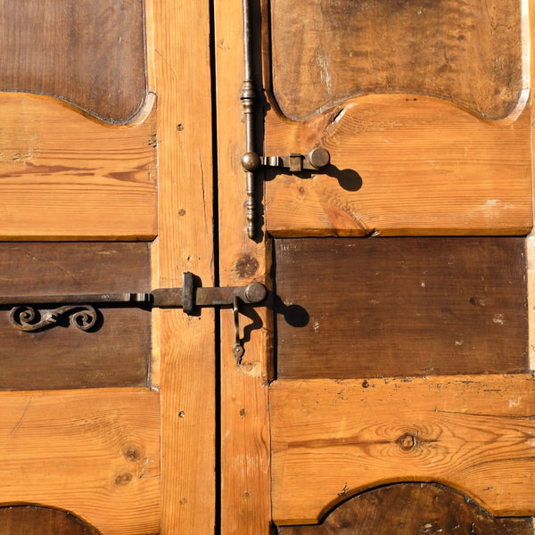 Antique framed two-panel library door, pine with walnut panels