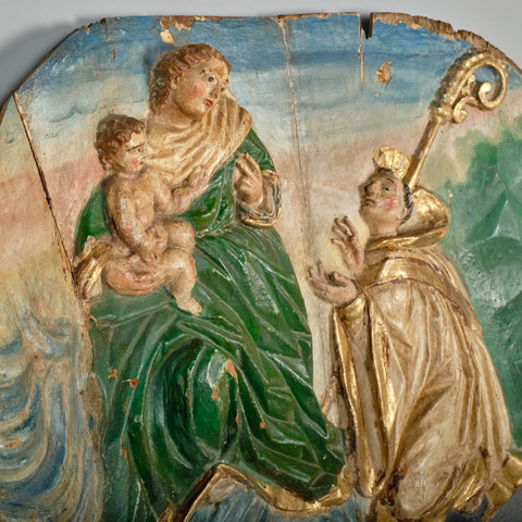 Pair of antique carved and polychromed bas relief panels, “The Visitation” and the “Stigmata of St. Francis”