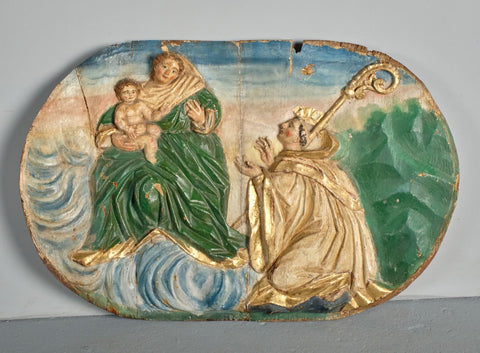 Pair of antique carved and polychromed bas relief panels, “The Visitation” and the “Stigmata of St. Francis”