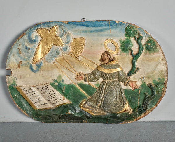 Pair of antique carved and polychromed bas relief panels, “The Visitation” and the “Stigmata of St. Francis”