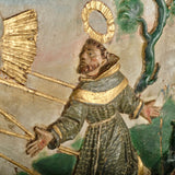 Pair of antique carved and polychromed bas relief panels, “The Visitation” and the “Stigmata of St. Francis”
