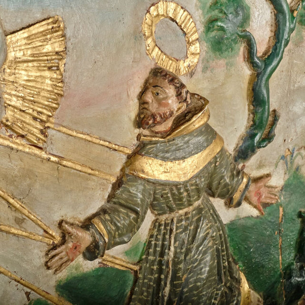 Pair of antique carved and polychromed bas relief panels, “The Visitation” and the “Stigmata of St. Francis”