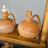 Antique two-tier, six hole water jug stand with original clay jugs, pine